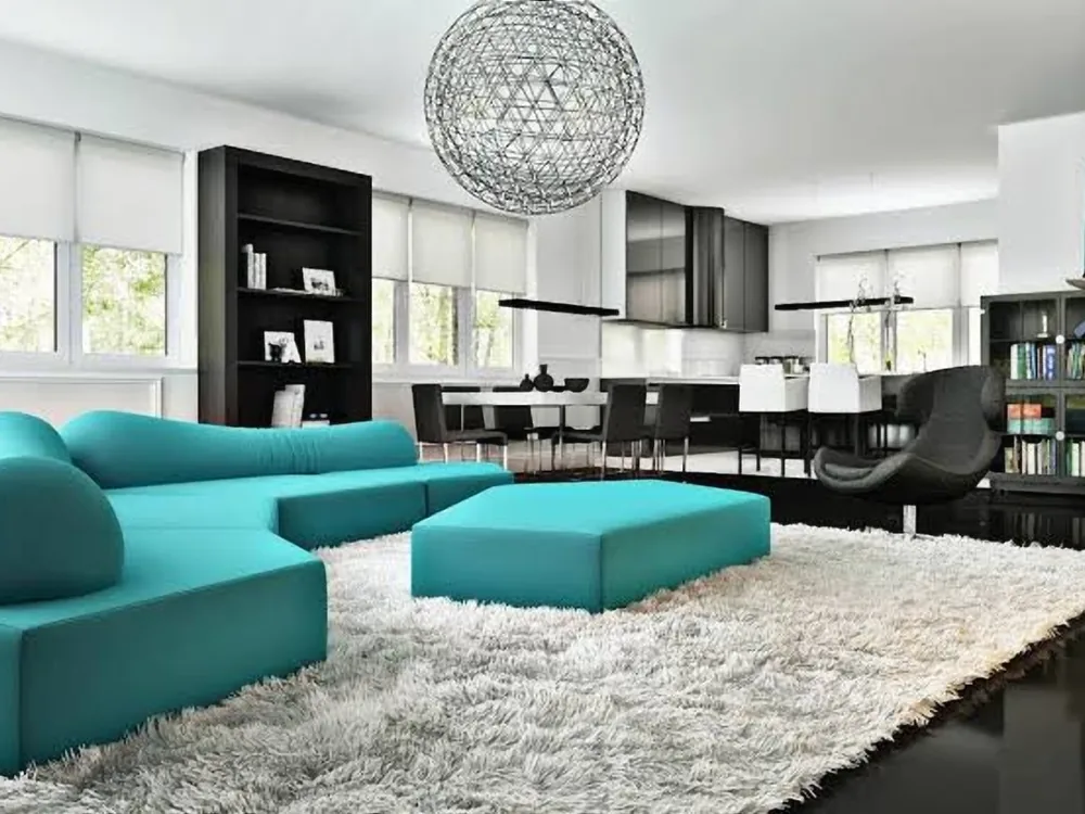 Séjour d’appartement rénové, canapé et tapis clair